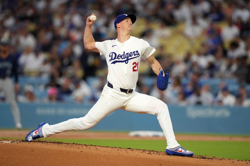 Aug 20, 2024; Los Angeles, California, USA; Los Angeles Dodgers starting pitcher Walker Buehler (21) throws in the third inning against the Seattle Mariners at Dodger Stadium. Mandatory Credit: Kirby Lee-USA TODAY Sports