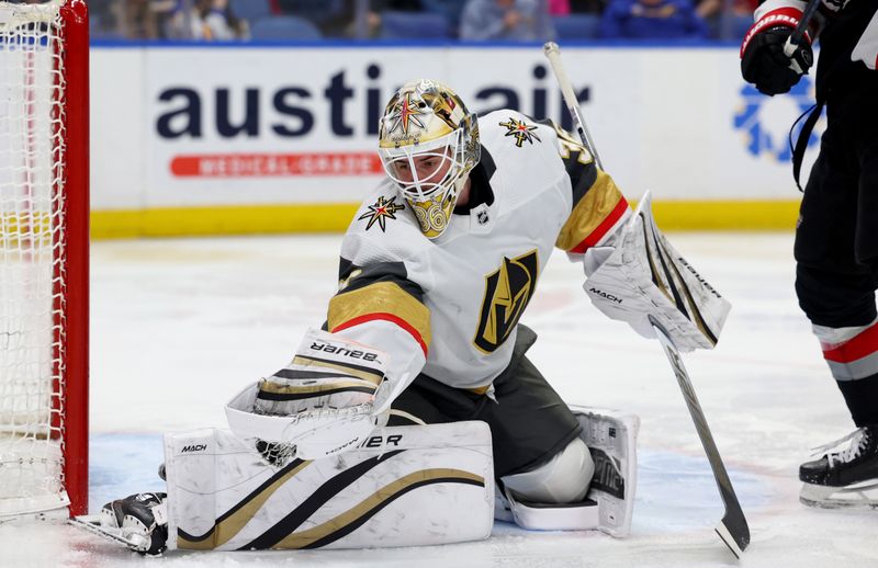 Mar 2, 2024; Buffalo, New York, USA;  Vegas Golden Knights goaltender Logan Thompson (36) makes a glove save during the second period against the Buffalo Sabres at KeyBank Center. Mandatory Credit: Timothy T. Ludwig-USA TODAY Sports