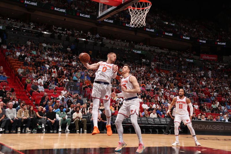 MIAMI, FL - APRIL 2: Donte Divincenzo #0 of the New York Knicks handles the ball during the game against the Miami Heat on April 2, 2024 at Kaseya Center in Miami, Florida. NOTE TO USER: User expressly acknowledges and agrees that, by downloading and or using this Photograph, user is consenting to the terms and conditions of the Getty Images License Agreement. Mandatory Copyright Notice: Copyright 2024 NBAE (Photo by Issac Baldizon/NBAE via Getty Images)