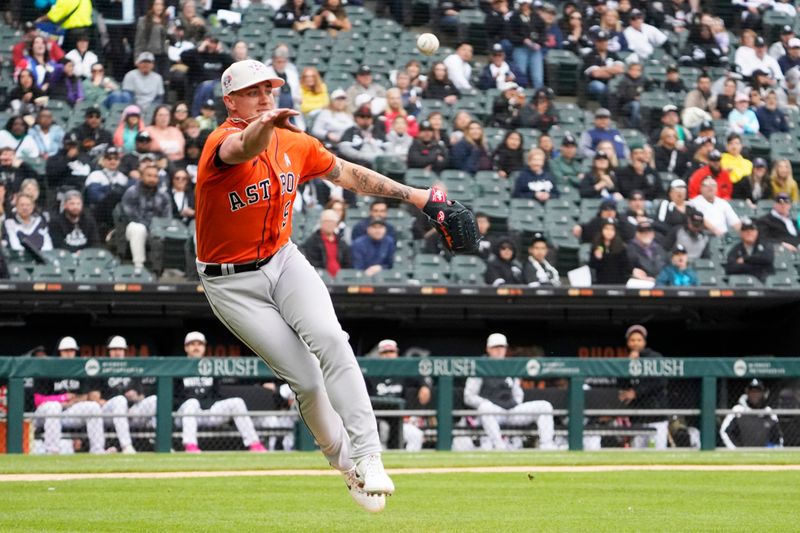 May 14, 2023; Chicago, Illinois, USA; Chicago White Sox right fielder Gavin Sheets (not pictured) beats out an infield single as Houston Astros starting pitcher Hunter Brown (58) tries to throw him out during the fourth inning at Guaranteed Rate Field. Mandatory Credit: David Banks-USA TODAY Sports