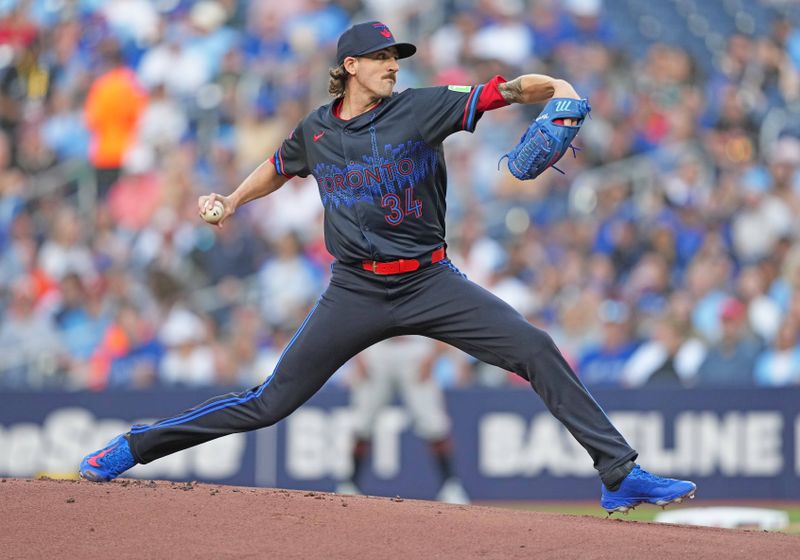 Jun 3, 2024; Toronto, Ontario, CAN; Toronto Blue Jays starting pitcher Kevin Gausman (34) throws a pitch against the Baltimore Orioles during the first inning at Rogers Centre. Mandatory Credit: Nick Turchiaro-USA TODAY Sports