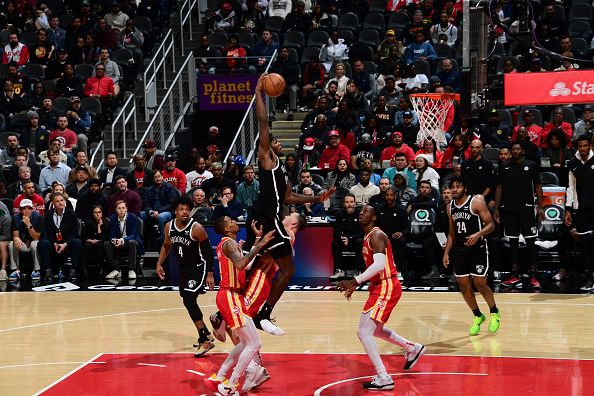 ATLANTA, GA - DECEMBER 6: Day'Ron Sharpe #20 of the Brooklyn Nets dunks the ball during the game against the Atlanta Hawks on December 6, 2023 at State Farm Arena in Atlanta, Georgia.  NOTE TO USER: User expressly acknowledges and agrees that, by downloading and/or using this Photograph, user is consenting to the terms and conditions of the Getty Images License Agreement. Mandatory Copyright Notice: Copyright 2023 NBAE (Photo by Scott Cunningham/NBAE via Getty Images)