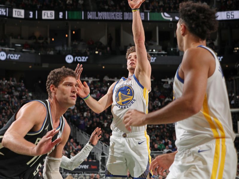 MILWAUKEE, WI - JANUARY 13: Brandin Podziemski #2 of the Golden State Warriors shoots the ball during the game against the Milwaukee Bucks on January 13, 2024 at the Fiserv Forum Center in Milwaukee, Wisconsin. NOTE TO USER: User expressly acknowledges and agrees that, by downloading and or using this Photograph, user is consenting to the terms and conditions of the Getty Images License Agreement. Mandatory Copyright Notice: Copyright 2024 NBAE (Photo by Gary Dineen/NBAE via Getty Images).