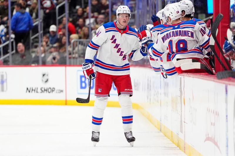 Jan 14, 2025; Denver, Colorado, USA; New York Rangers center Adam Edstrom (84) celebrates his goal in the second period against the Colorado Avalanche at Ball Arena. Mandatory Credit: Ron Chenoy-Imagn Images