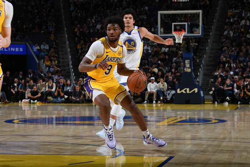 SAN FRANCISCO, CA - OCTOBER 18: Bronny James #9 of the Los Angeles Lakers handles the ball during the game against the Golden State Warriors during a NBA Preseason game on October 18, 2024 at Chase Center in San Francisco, California. NOTE TO USER: User expressly acknowledges and agrees that, by downloading and or using this photograph, user is consenting to the terms and conditions of Getty Images License Agreement. Mandatory Copyright Notice: Copyright 2024 NBAE (Photo by Noah Graham/NBAE via Getty Images)