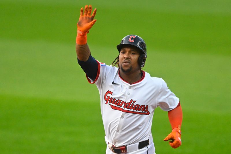 Sep 9, 2025; Cleveland, Ohio, USA; Cleveland Guardians third baseman Jose Ramirez (11) celebrates his solo home run in the first inning against the Kansas City Royals at Progressive Field. Mandatory Credit: David Richard-Imagn Images