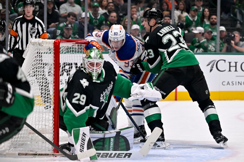 Mar 12, 2026; Dallas, Texas, USA; Dallas Stars goaltender Jake Oettinger (29) and defenseman Esa Lindell (23) and Edmonton Oilers center Connor McDavid (97) look for the puck in the Dallas zone during the first period at the American Airlines Center. Mandatory Credit: Jerome Miron-Imagn Images