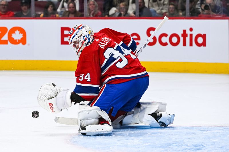 Oct 22, 2022; Montreal, Quebec, CAN; Montreal Canadiens goalie Jake Allen (34) makes a save against the Dallas Stars during the second period at Bell Centre. Mandatory Credit: David Kirouac-USA TODAY Sports