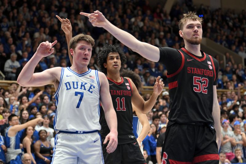 Feb 15, 2025; Durham, North Carolina, USA;  Duke Blue Devils forward Kon Knueppel (7), Stanford Cardinal forward Aidan Cammann (52), and Stanford Cardinal guard Ryan Agarwal (11) wait on the referee's call during the first half at Cameron Indoor Stadium. Mandatory Credit: Zachary Taft-Imagn Images