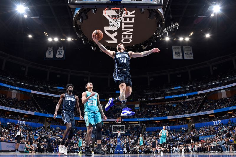 ORLANDO, FL - MARCH 19: Cole Anthony #50 of the Orlando Magic drives to the basket during the game against the Charlotte Hornets on March 19, 2024 at the Kia Center in Orlando, Florida. NOTE TO USER: User expressly acknowledges and agrees that, by downloading and or using this photograph, User is consenting to the terms and conditions of the Getty Images License Agreement. Mandatory Copyright Notice: Copyright 2024 NBAE (Photo by Fernando Medina/NBAE via Getty Images)