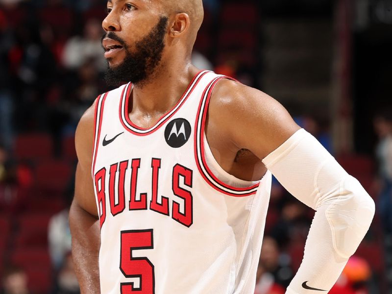 CHICAGO, IL - OCTOBER 19: Jevon Carter #5 of the Chicago Bulls looks on during the game against the Minnesota Timberwolves on October 19, 2023 at United Center in Chicago, Illinois. NOTE TO USER: User expressly acknowledges and agrees that, by downloading and or using this photograph, User is consenting to the terms and conditions of the Getty Images License Agreement. Mandatory Copyright Notice: Copyright 2023 NBAE (Photo by Jeff Haynes/NBAE via Getty Images)