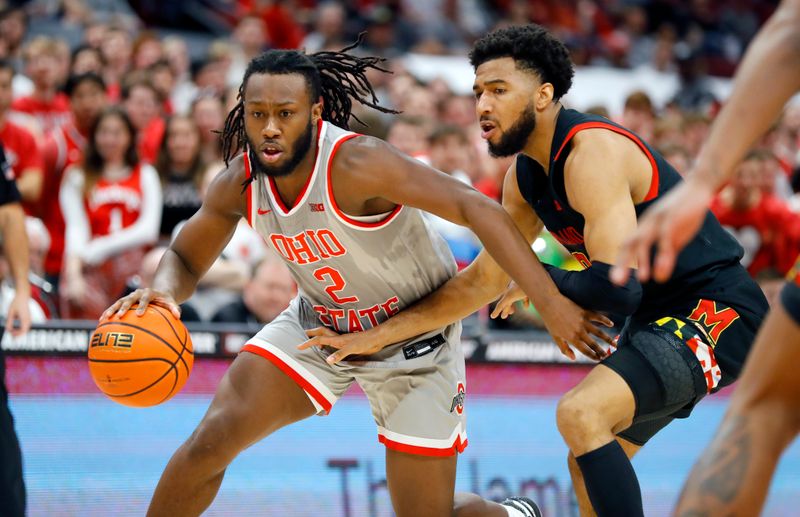 Mar 1, 2023; Columbus, Ohio, USA;  Ohio State Buckeyes guard Bruce Thornton (2) dribbles past Maryland Terrapins forward Julian Reese (10) during the second half at Value City Arena. Mandatory Credit: Joseph Maiorana-USA TODAY Sports