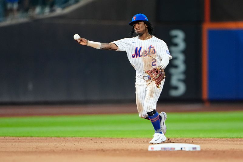 Sep 22, 2024; New York City, New York, USA;  New York Mets shortstop Luisangel Acuna (2) throws out Philadelphia Phillies third baseman Alec Bohm (not pictured) during the eighth inning at Citi Field. Mandatory Credit: Gregory Fisher-Imagn Images