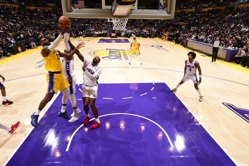 LOS ANGELES, CA - NOVEMBER 8: LeBron James #23 of the Los Angeles Lakers shoots the ball during the game against the Philadelphia 76ers on Novemberr 8, 2024 at Crypto.Com Arena in Los Angeles, California. NOTE TO USER: User expressly acknowledges and agrees that, by downloading and/or using this Photograph, user is consenting to the terms and conditions of the Getty Images License Agreement. Mandatory Copyright Notice: Copyright 2024 NBAE (Photo by Adam Pantozzi/NBAE via Getty Images)