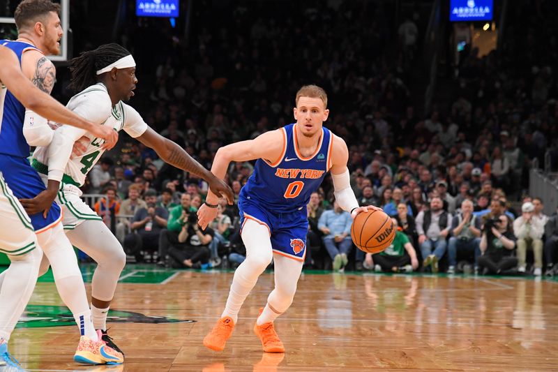 BOSTON, MA - APRIL 11: Donte Divincenzo #0 of the New York Knicks dribbles the ball during the game against the Boston Celtics  on April 11, 2024 at the TD Garden in Boston, Massachusetts. NOTE TO USER: User expressly acknowledges and agrees that, by downloading and or using this photograph, User is consenting to the terms and conditions of the Getty Images License Agreement. Mandatory Copyright Notice: Copyright 2024 NBAE  (Photo by Brian Babineau/NBAE via Getty Images)