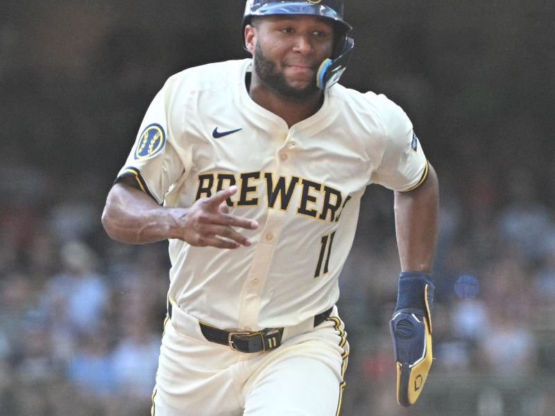 Jul 31, 2024; Milwaukee, Wisconsin, USA; Milwaukee Brewers outfielder Jackson Chourio (11) runs safely to third base against the Atlanta Braves in the first inning at American Family Field. Mandatory Credit: Michael McLoone-USA TODAY Sports