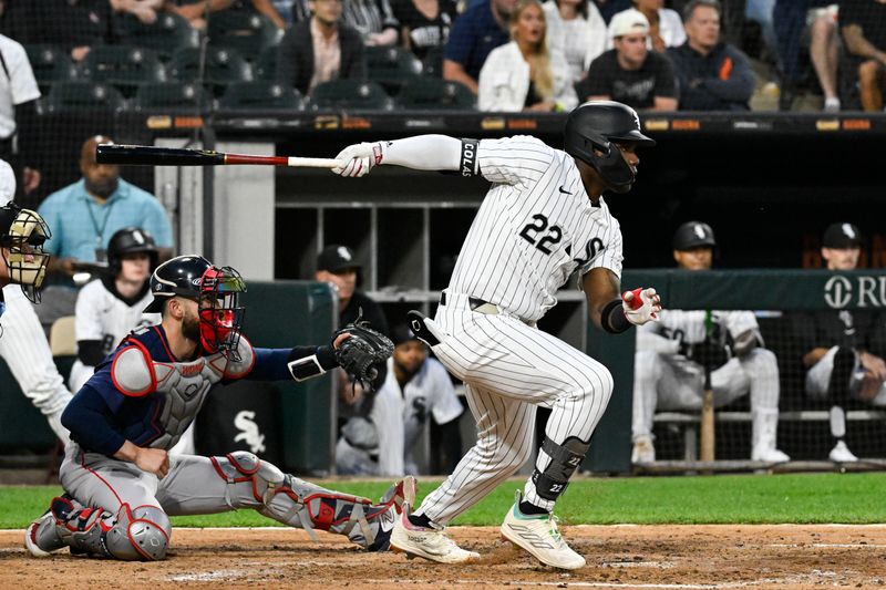 Jun 7, 2024; Chicago, Illinois, USA;  Chicago White Sox outfielder Oscar Colás (22) hits a two RBI single against the Boston Red Sox during the fourth inning at Guaranteed Rate Field. Mandatory Credit: Matt Marton-USA TODAY Sports