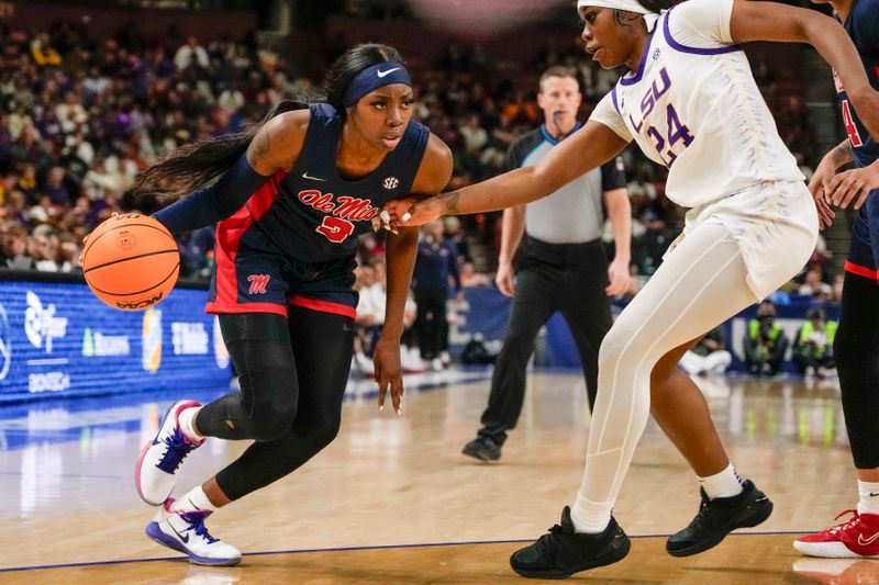 Mar 9, 2024; Greensville, SC, USA; Ole Miss Rebels forward Snudda Collins (5) drives to the basket against LSU Lady Tigers guard Aneesah Morrow (24) during the first half at Bon Secours Wellness Arena. Mandatory Credit: Jim Dedmon-USA TODAY Sports