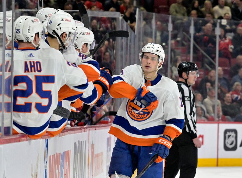 Jan 25, 2024; Montreal, Quebec, CAN; New York Islanders forward Matthew Barzal (13) celebrates with teammates after scoring a goal against the Montreal Canadiens during the third period at the Bell Centre. Mandatory Credit: Eric Bolte-USA TODAY Sports