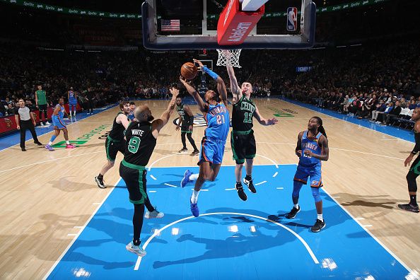 OKLAHOMA CITY, OK - JANUARY 2: Aaron Wiggins #21 of the Oklahoma City Thunder drives to the basket during the game against the Boston Celtics on January 2, 2024 at Paycom Arena in Oklahoma City, Oklahoma. NOTE TO USER: User expressly acknowledges and agrees that, by downloading and or using this photograph, User is consenting to the terms and conditions of the Getty Images License Agreement. Mandatory Copyright Notice: Copyright 2024 NBAE (Photo by Zach Beeker/NBAE via Getty Images)