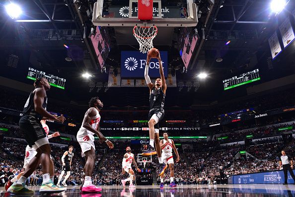 SAN ANTONIO, TX - NOVEMBER 5: Victor Wembanyama #1 of the San Antonio Spurs dunks the ball during the game against the Toronto Raptors on November 5, 2023 at the Frost Bank Center in San Antonio, Texas. NOTE TO USER: User expressly acknowledges and agrees that, by downloading and or using this photograph, user is consenting to the terms and conditions of the Getty Images License Agreement. Mandatory Copyright Notice: Copyright 2023 NBAE (Photos by Michael Gonzales/NBAE via Getty Images)