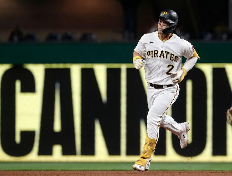 Sep 5, 2023; Pittsburgh, Pennsylvania, USA; Pittsburgh Pirates right fielder Connor Joe (2) circles the bases on a three run home run against the Milwaukee Brewers during the ninth inning at PNC Park. The Brewers won 7-3. Mandatory Credit: Charles LeClaire-USA TODAY Sports