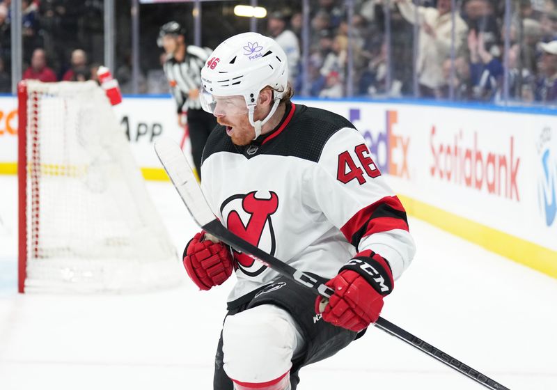 Mar 26, 2024; Toronto, Ontario, CAN; New Jersey Devils center Max Willman (46) celebrates scoring a goal against the Toronto Maple Leafs during the second period at Scotiabank Arena. Mandatory Credit: Nick Turchiaro-USA TODAY Sports