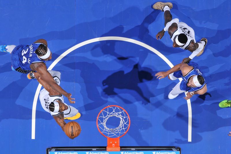 ORLANDO, FL - MARCH 13: Nicolas Claxton #33 of the Brooklyn Nets drives to the basket during the game against the Orlando Magic on March 13, 2024 at the Kia Center in Orlando, Florida. NOTE TO USER: User expressly acknowledges and agrees that, by downloading and or using this photograph, User is consenting to the terms and conditions of the Getty Images License Agreement. Mandatory Copyright Notice: Copyright 2024 NBAE (Photo by Fernando Medina/NBAE via Getty Images)