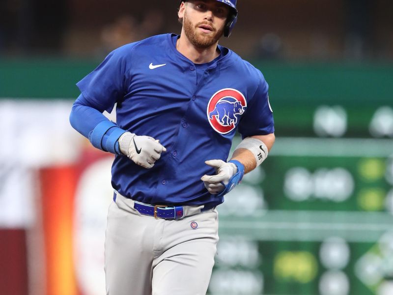 Apr 29, 2025; Pittsburgh, Pennsylvania, USA;  Chicago Cubs catcher Carson Kelly (15) circles the bases after a two-run home run against the Pittsburgh Pirates during the fourth inning at PNC Park. Mandatory Credit: Charles LeClaire-Imagn Images