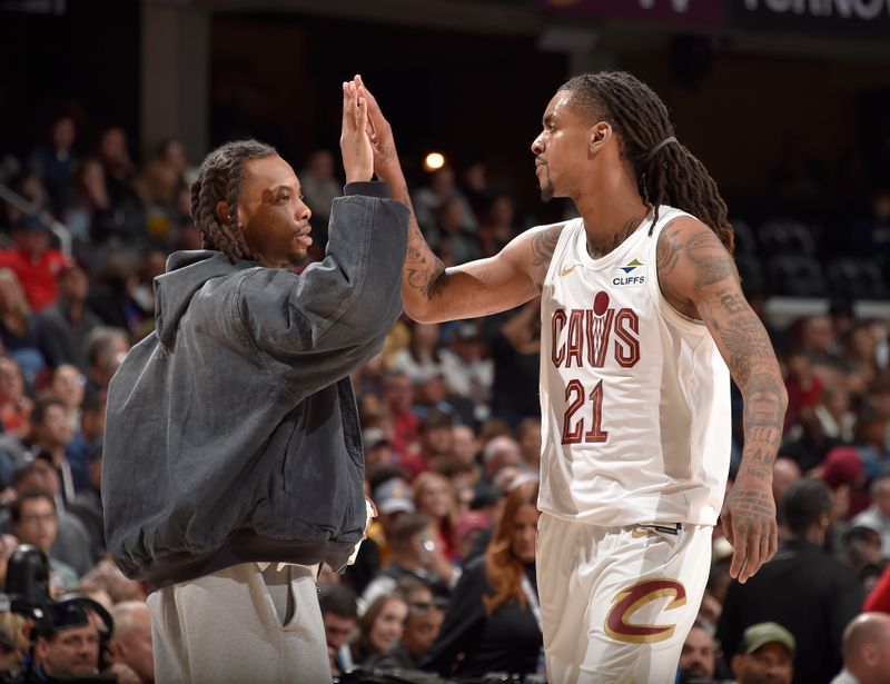 CLEVELAND, OH - APRIL 13: Darius Garland #10 high fives Emoni Bates #21 of the Cleveland Cavaliers during the game against the Indiana Pacers  on April 13, 2025 at Rocket Arena in Cleveland, Ohio. NOTE TO USER: User expressly acknowledges and agrees that, by downloading and/or using this Photograph, user is consenting to the terms and conditions of the Getty Images License Agreement. Mandatory Copyright Notice: Copyright 2025 NBAE (Photo by David Liam Kyle/NBAE via Getty Images)