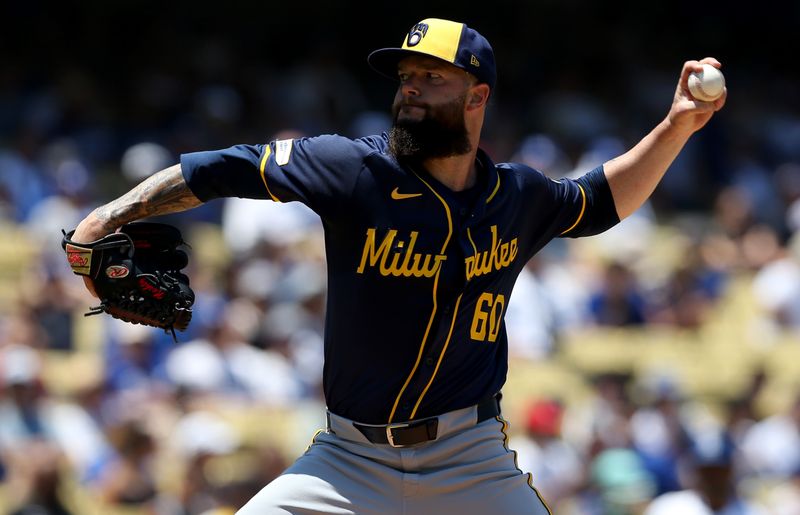 Jul 7, 2024; Los Angeles, California, USA; Milwaukee Brewers pitcher Dallas Keuchel (60) throws during the second inning against the Los Angeles Dodgers at Dodger Stadium. Mandatory Credit: Jason Parkhurst-USA TODAY Sports