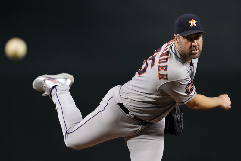 Sep 30, 2023; Phoenix, Arizona, USA; Houston Astros starting pitcher Justin Verlander (35) pitches against the Arizona Diamondbacks during the fourth inning at Chase Field. Mandatory Credit: Joe Camporeale-USA TODAY Sports