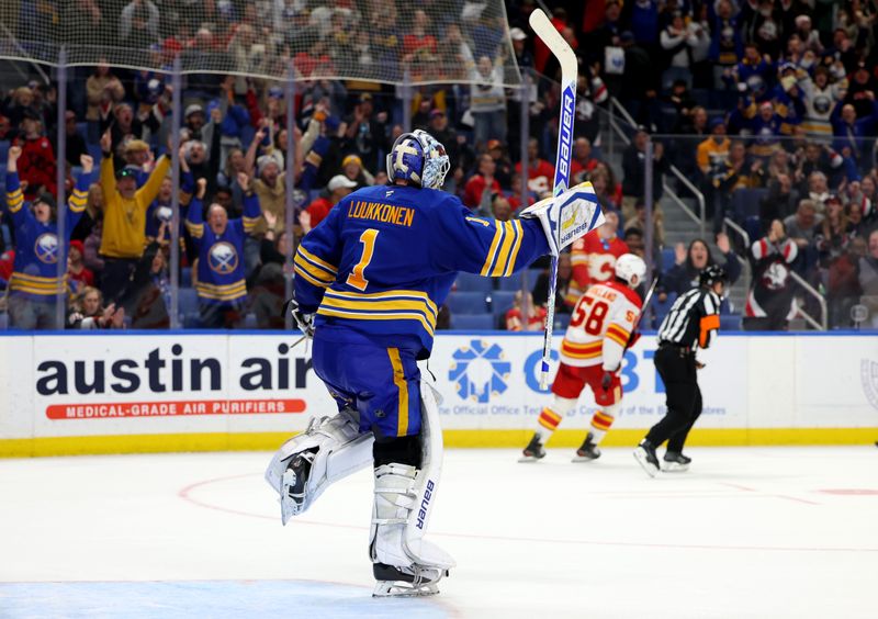 Nov 9, 2024; Buffalo, New York, USA;  Buffalo Sabres goaltender Ukko-Pekka Luukkonen (1) reacts after winning the game in a shootout against the Calgary Flames at KeyBank Center. Mandatory Credit: Timothy T. Ludwig-Imagn Images