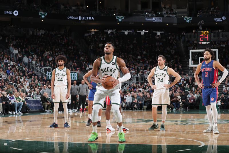 MILWAUKEE, WI - NOVEMBER 13: Giannis Antetokounmpo #34 of the Milwaukee Bucks shoots a free throw during the game against the Detroit Pistons on November 13, 2024 at the Fiserv Forum Center in Milwaukee, Wisconsin. NOTE TO USER: User expressly acknowledges and agrees that, by downloading and or using this Photograph, user is consenting to the terms and conditions of the Getty Images License Agreement. Mandatory Copyright Notice: Copyright 2024 NBAE (Photo by Gary Dineen/NBAE via Getty Images).