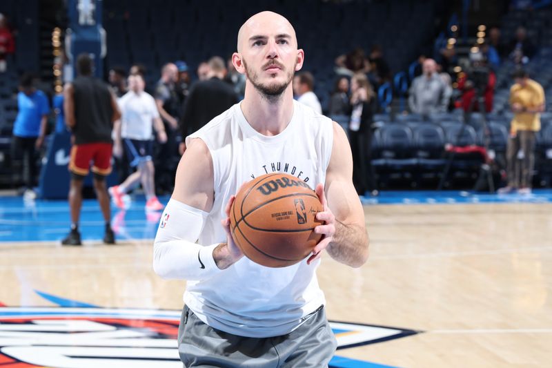 OKLAHOMA CITY, OK - JANUARY 16: Alex Caruso #9 of the Oklahoma City Thunder warms up before the game against the Cleveland Cavaliers on January 16, 2025 at Paycom Center in Oklahoma City, Oklahoma. NOTE TO USER: User expressly acknowledges and agrees that, by downloading and or using this photograph, User is consenting to the terms and conditions of the Getty Images License Agreement. Mandatory Copyright Notice: Copyright 2025 NBAE (Photo by Jeff Haynes/NBAE via Getty Images)