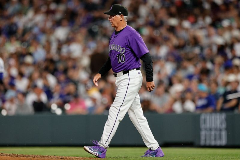 Jun 17, 2024; Denver, Colorado, USA; Colorado Rockies manager Bud Black (10) walks out to the mound in the eighth inning against the Los Angeles Dodgers at Coors Field. Mandatory Credit: Isaiah J. Downing-USA TODAY Sports