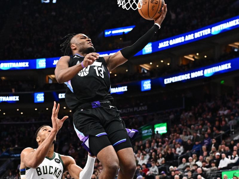 SALT LAKE CITY, UT - JANUARY 27: Isaiah Collier #13 of the Utah Jazz drives to the basket during the game against the Milwaukee Bucks on January 27, 2025 at Delta Center in Salt Lake City, Utah. NOTE TO USER: User expressly acknowledges and agrees that, by downloading and or using this Photograph, User is consenting to the terms and conditions of the Getty Images License Agreement. Mandatory Copyright Notice: Copyright 2025 NBAE (Photo by Jamie Sabau/NBAE via Getty Images)