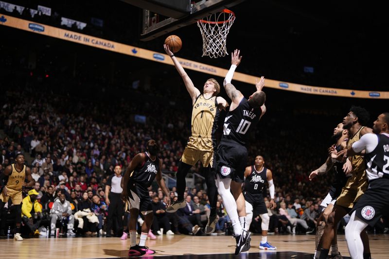 TORONTO, CANADA - JANUARY 26: Gradey Dick #1 of the Toronto Raptors drives to the basket during the game against the LA Clippers on January 26, 2024 at the Scotiabank Arena in Toronto, Ontario, Canada.  NOTE TO USER: User expressly acknowledges and agrees that, by downloading and or using this Photograph, user is consenting to the terms and conditions of the Getty Images License Agreement.  Mandatory Copyright Notice: Copyright 2024 NBAE (Photo by Mark Blinch/NBAE via Getty Images)