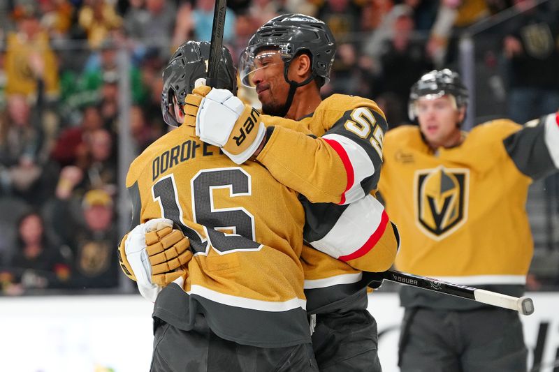 Jan 29, 2026; Las Vegas, Nevada, USA; Vegas Golden Knights right wing Keegan Kolesar (55) celebrates with Vegas Golden Knights right wing Pavel Dorofeyev (16) after scoring a goal against the Dallas Stars during the second period at T-Mobile Arena. Mandatory Credit: Stephen R. Sylvanie-Imagn Images