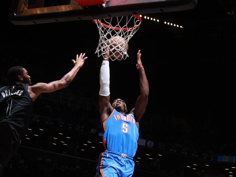 BROOKLYN, NY - JANUARY 5: Luguentz Dort #5 of the Oklahoma City Thunder goes to the basket during the game on January 5, 2024 at Barclays Center in Brooklyn, New York. NOTE TO USER: User expressly acknowledges and agrees that, by downloading and or using this Photograph, user is consenting to the terms and conditions of the Getty Images License Agreement. Mandatory Copyright Notice: Copyright 2024 NBAE (Photo by Nathaniel S. Butler/NBAE via Getty Images)