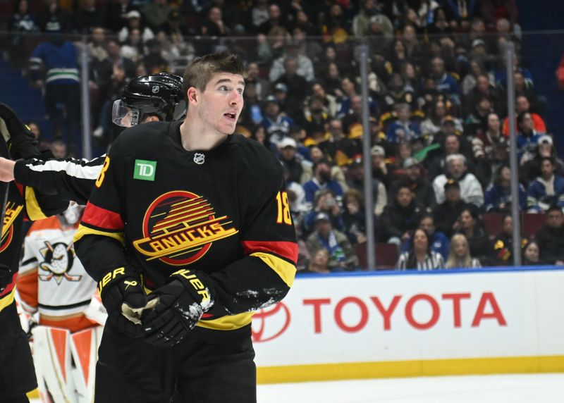 Mar 5, 2025; Vancouver, British Columbia, CAN; Vancouver Canucks forward Drew O'Connor (18) reacts after a fight during the third period against the Anaheim Ducks at Rogers Arena. Mandatory Credit: Simon Fearn-Imagn Images