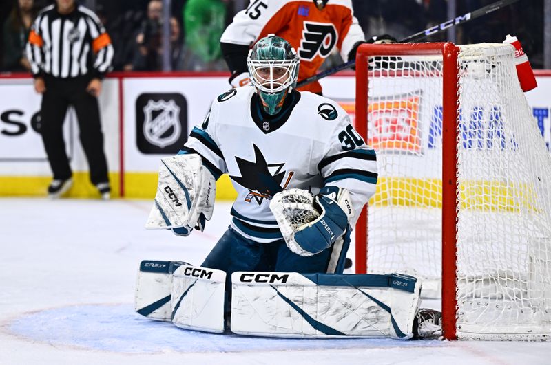 Mar 12, 2024; Philadelphia, Pennsylvania, USA; San Jose Sharks goalie Magnus Chrona (30) defends the net without his stick against the Philadelphia Flyers in the third period at Wells Fargo Center. Mandatory Credit: Kyle Ross-USA TODAY Sports