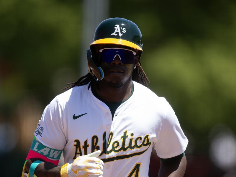 May 7, 2025; West Sacramento, California, USA; Athletics right fielder Lawrence Butler (4) runs out his solo home run against the Seattle Mariners during the fourth inning at Sutter Health Park. Mandatory Credit: D. Ross Cameron-Imagn Images