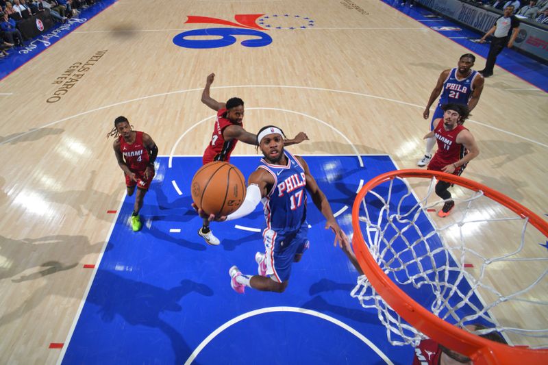 PHILADELPHIA, PA - APRIL 17: Buddy Heild #17 of the Philadelphia 76ers drives to the basket during the game against the Miami Heat during the 2024 NBA Play-In Tournament on April 17, 2024 at the Wells Fargo Center in Philadelphia, Pennsylvania NOTE TO USER: User expressly acknowledges and agrees that, by downloading and/or using this Photograph, user is consenting to the terms and conditions of the Getty Images License Agreement. Mandatory Copyright Notice: Copyright 2024 NBAE (Photo by Jesse D. Garrabrant/NBAE via Getty Images)