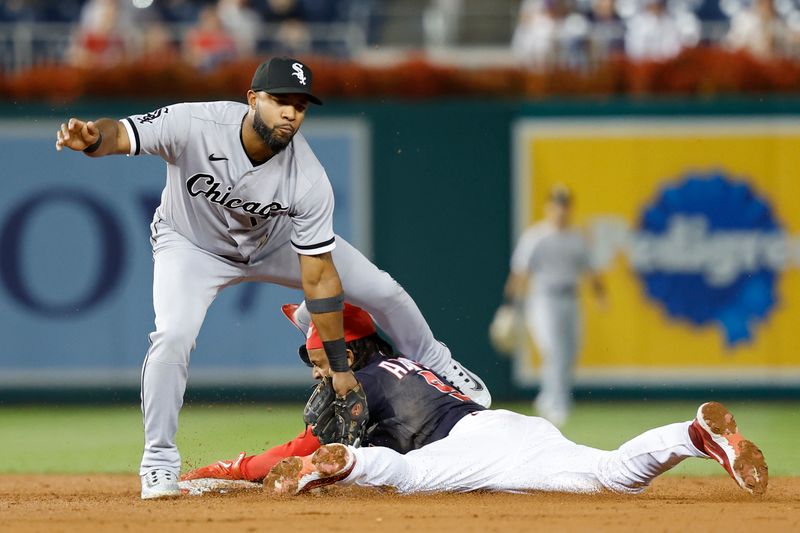 Sep 18, 2023; Washington, District of Columbia, USA; Washington Nationals shortstop CJ Abrams (5) steals second base ahead of a tag by Chicago White Sox shortstop Elvis Andrus (1) during the third inning at Nationals Park. Mandatory Credit: Geoff Burke-USA TODAY Sports