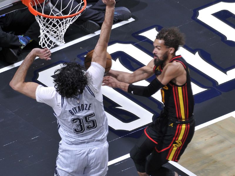 ORLANDO, FL - FEBRUARY 10: Trae Young #11 of the Atlanta Hawks passes the ball during the game against the Orlando Magic on February 10, 2025 at Kia Center in Orlando, Florida. NOTE TO USER: User expressly acknowledges and agrees that, by downloading and or using this photograph, User is consenting to the terms and conditions of the Getty Images License Agreement. Mandatory Copyright Notice: Copyright 2025 NBAE (Photo by Fernando Medina/NBAE via Getty Images)