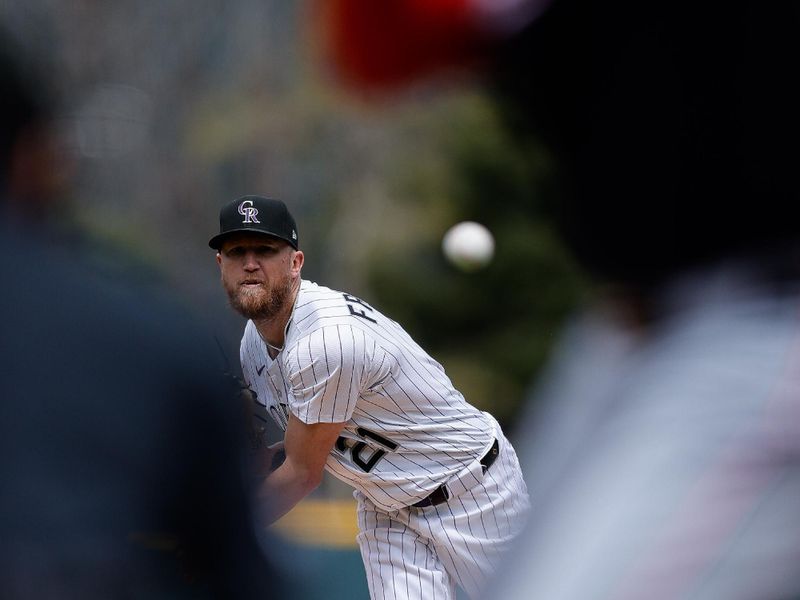 Apr 20, 2025; Denver, Colorado, USA; Colorado Rockies starting pitcher Kyle Freeland (21) pitches in the first inning against the Washington Nationals at Coors Field. Mandatory Credit: Isaiah J. Downing-Imagn Images