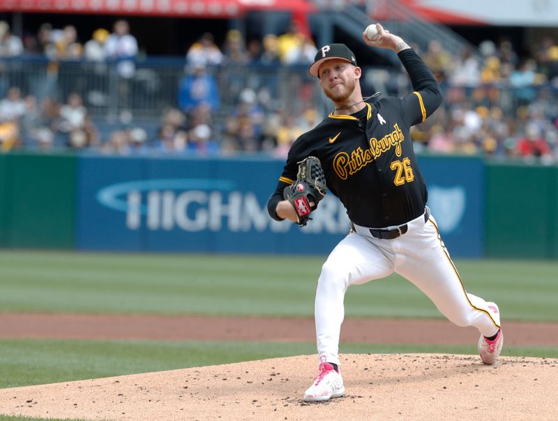 May 12, 2024; Pittsburgh, Pennsylvania, USA;  Pittsburgh Pirates starting pitcher Bailey Falter (26) delivers a pitch against the Chicago Cubs during the first inning at PNC Park. Mandatory Credit: Charles LeClaire-USA TODAY Sports