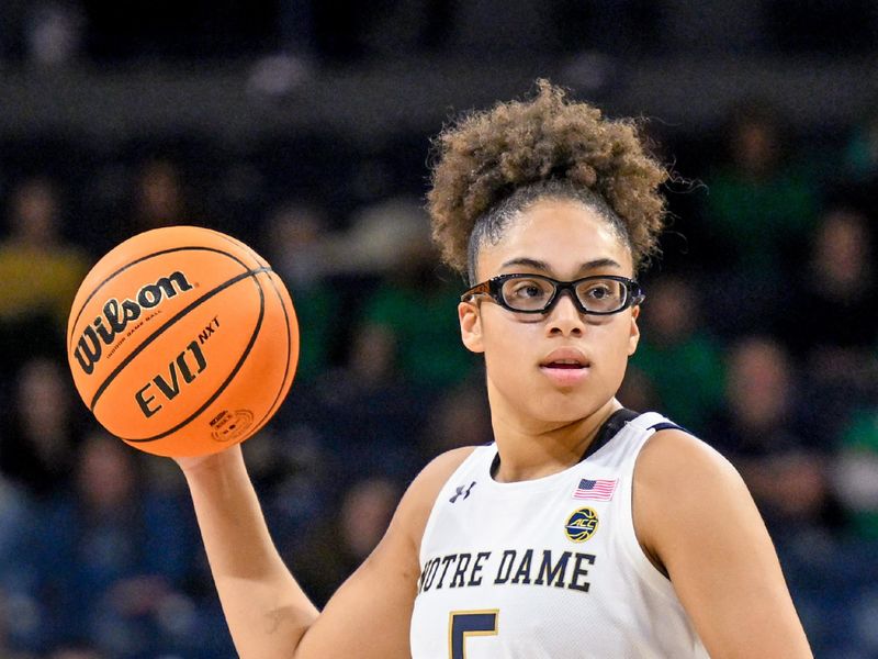 Feb 9, 2023; South Bend, Indiana, USA; Notre Dame Fighting Irish guard Olivia Miles (5) looks to pass in the second half against the Pittsburgh Panthers at the Purcell Pavilion. Mandatory Credit: Matt Cashore-USA TODAY Sports