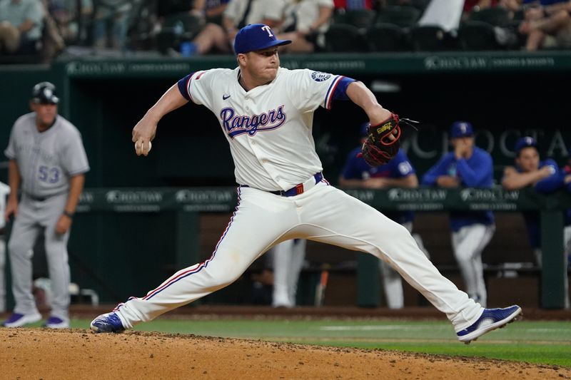 May 12, 2025; Arlington, Texas, USA; Texas Rangers pitcher Jacob Webb (71) throws to the plate during the ninth inning against the Colorado Rockies at Globe Life Field. Mandatory Credit: Raymond Carlin III-Imagn Images